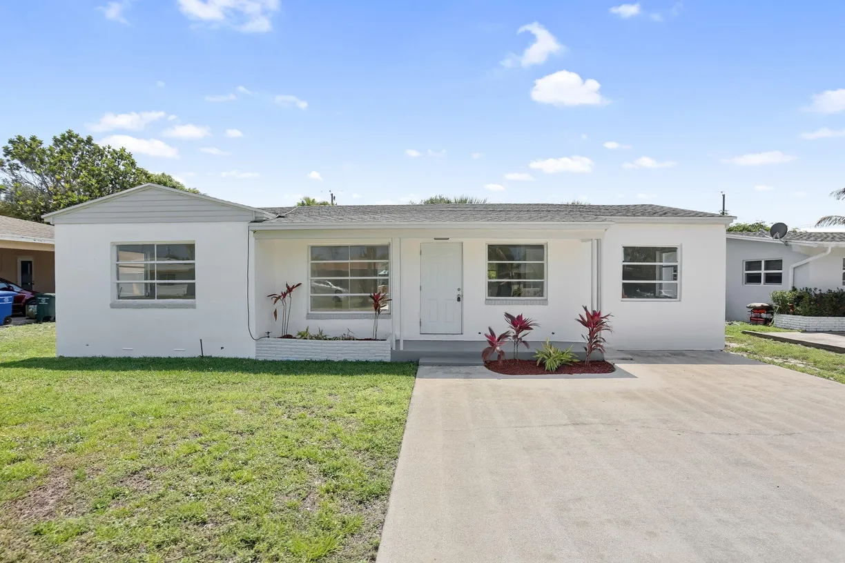 South Florida Real Estate | View 344 Cypress Drive | 3 Beds, 2 Baths