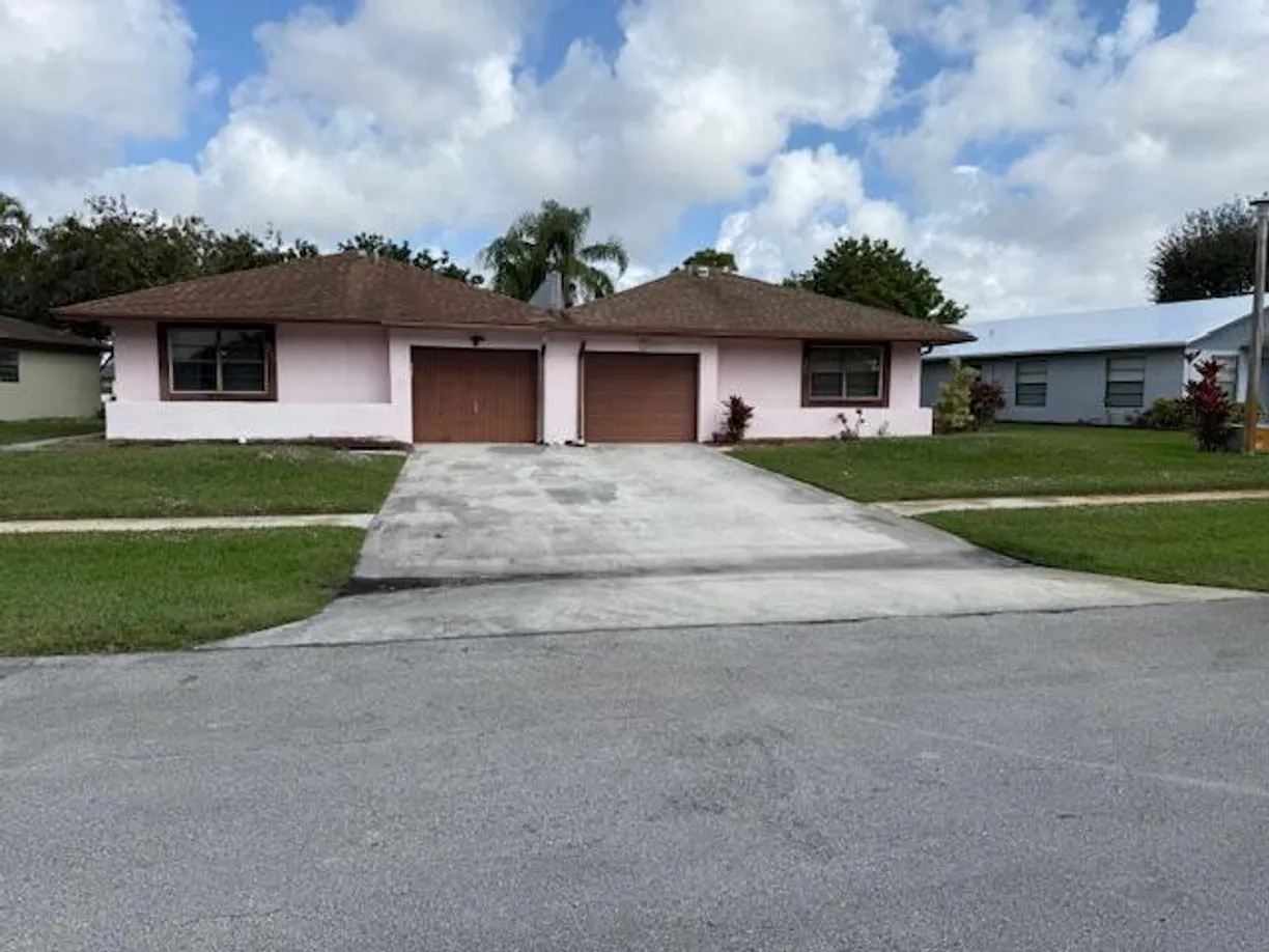 South Florida Real Estate | View 4891 Palm Hill Drive | 2 Beds, 2 Baths