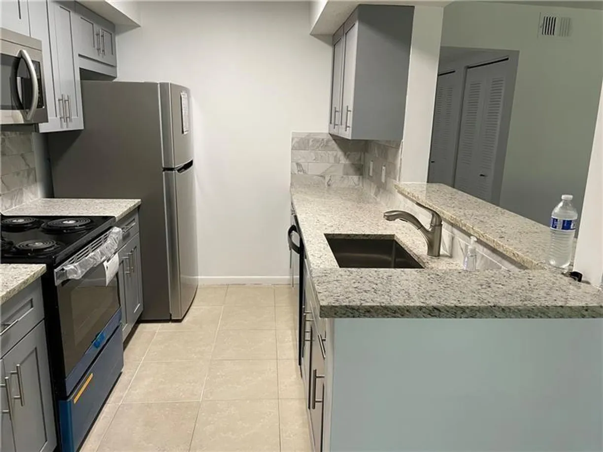 South Florida Real Estate | View 815 W Boynton Beach Boulevard, 13-103 | 1 Bed, 1 Bath