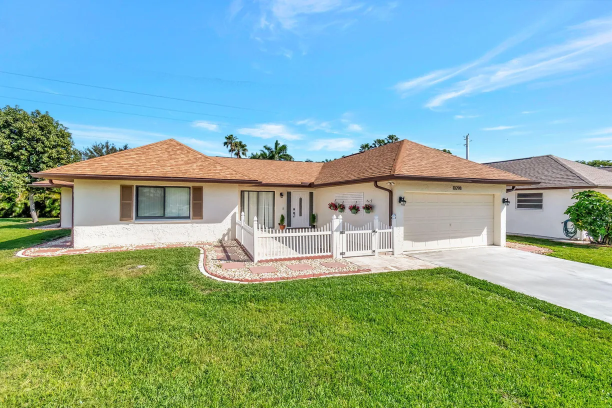 South Florida Real Estate | View 10298 Greentrail Drive | 3 Beds, 2 Baths
