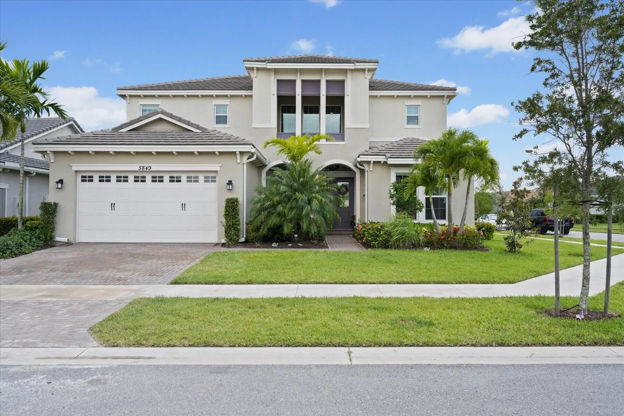 South Florida Real Estate | View 5849 Whippoorwill Circle | 5 Beds, 4 Baths