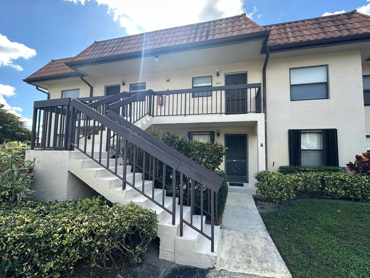 South Florida Real Estate | View 7094 Golf Colony Court, 102 | 2 Beds, 2 Baths