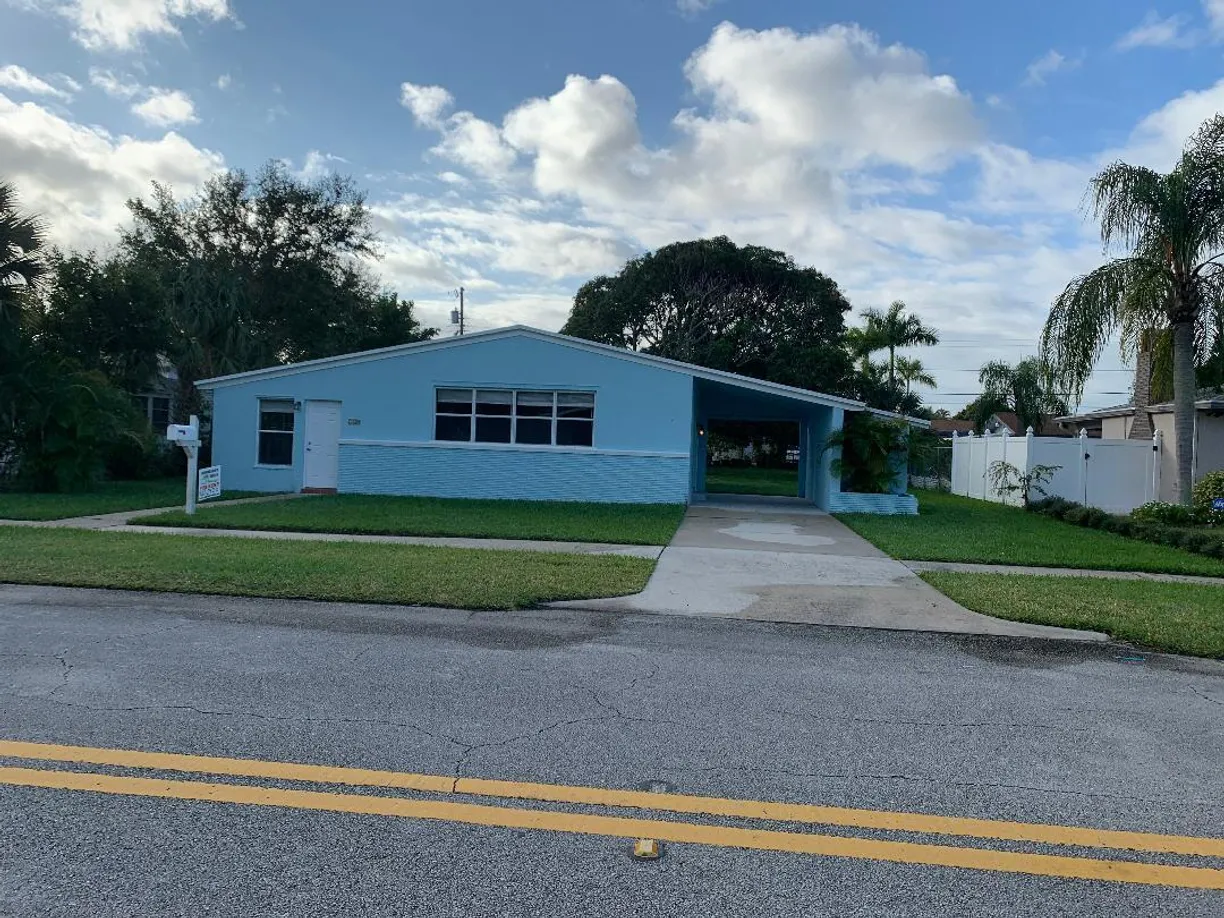 South Florida Real Estate | View 410 Cypress Drive | 3 Beds, 2 Baths