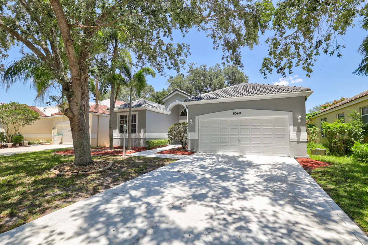 South Florida Real Estate | View 6349 NW 78 Drive | 4 Beds, 2 Baths