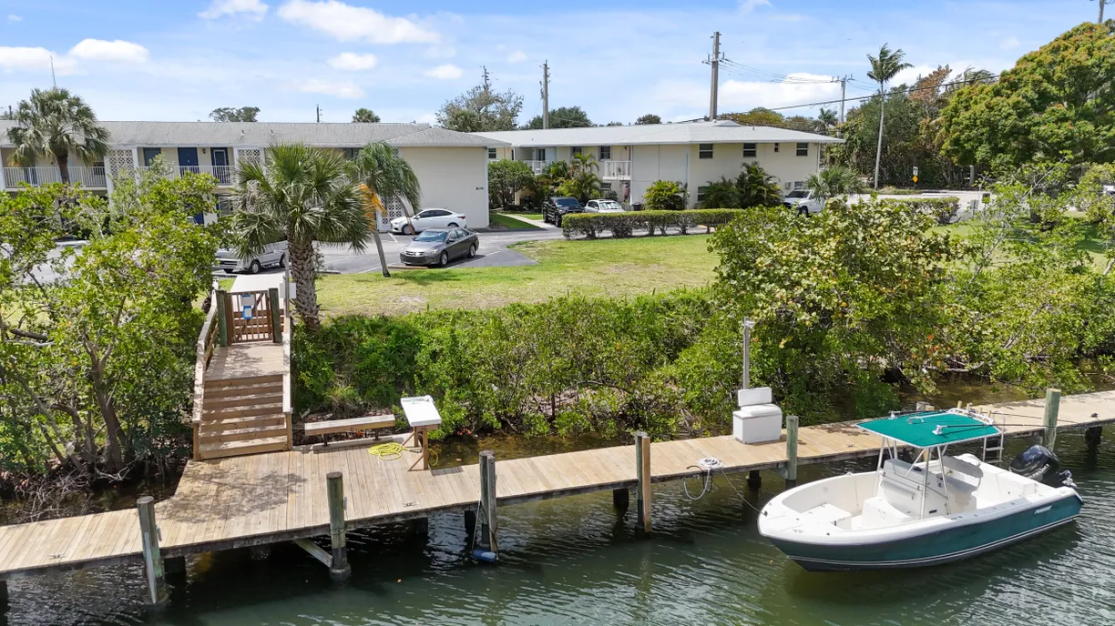 South Florida Real Estate | View 510 Prosperity Farms Road, 4b | 3 Beds, 2 Baths