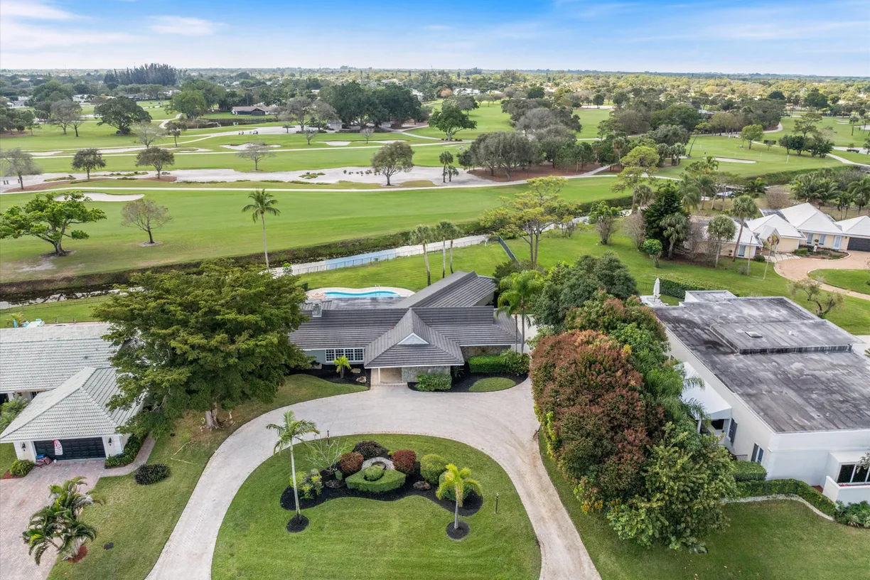 South Florida Real Estate | View 253 N Country Club Drive | 5 Beds, 3 Baths