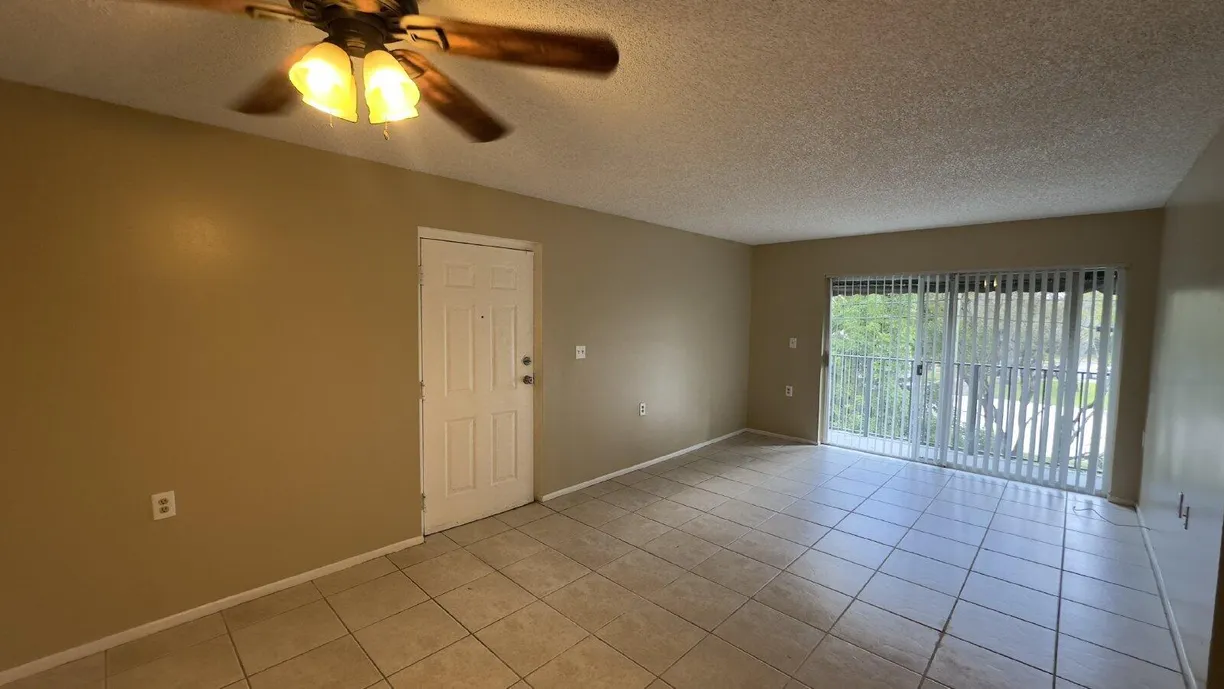 South Florida Real Estate | View 1068 N Benoist Farms Road, 307 | 2 Beds, 1 Bath