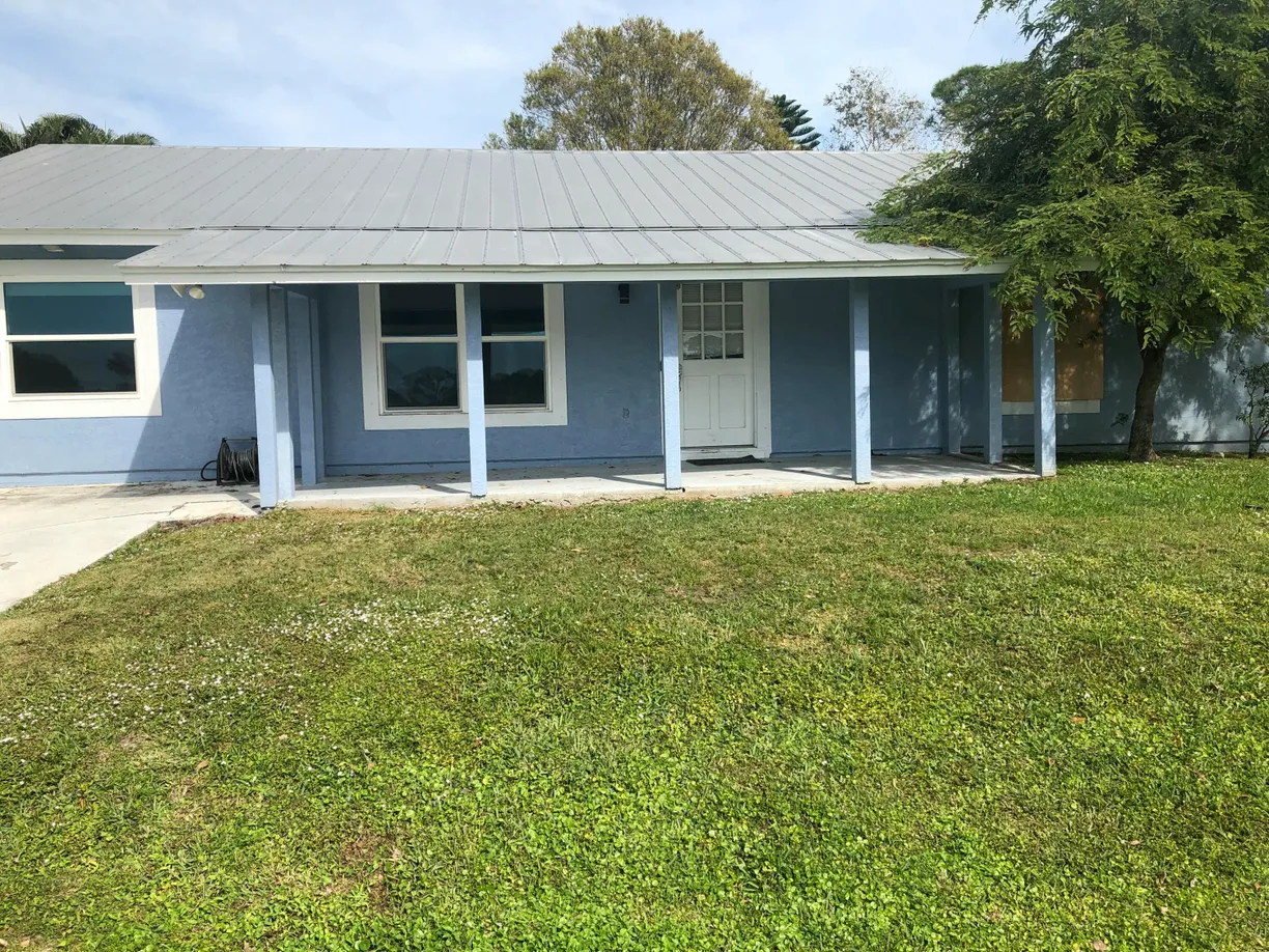 South Florida Real Estate | View 1415 SW Ulmus Place | 3 Beds, 2 Baths