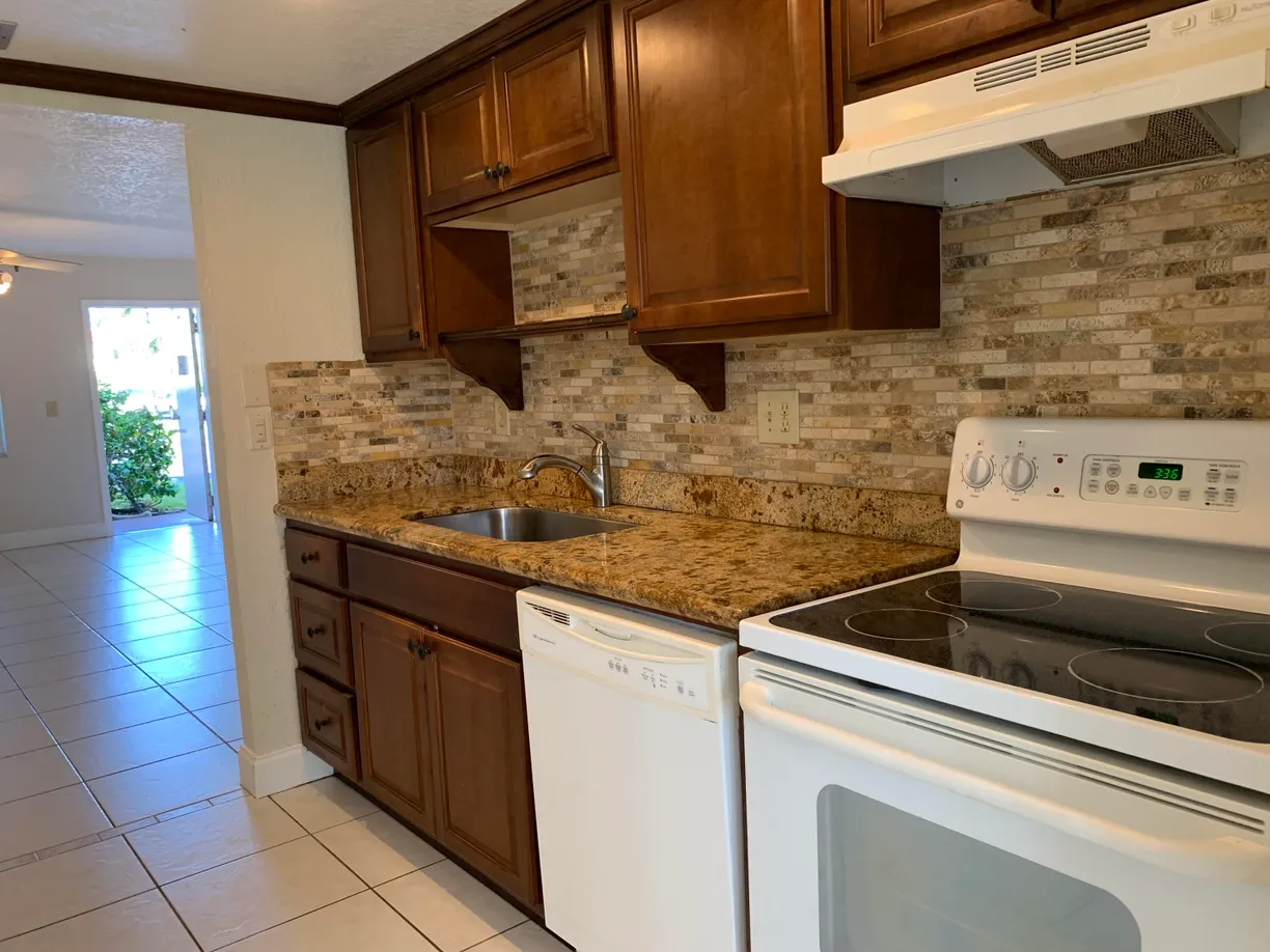 South Florida Real Estate | View 20 Abbey Lane, 105 | Listing