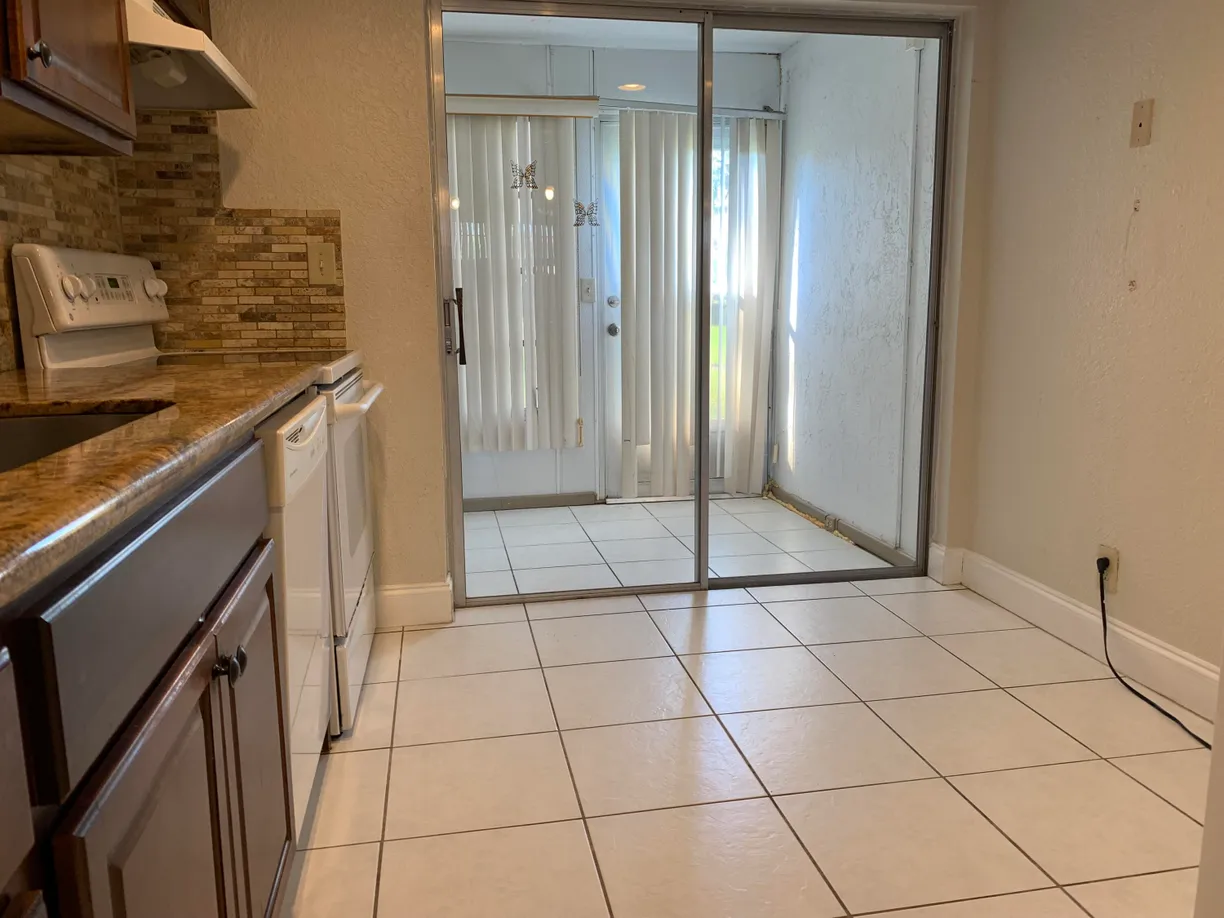South Florida Real Estate | View 20 Abbey Lane, 105 | Listing
