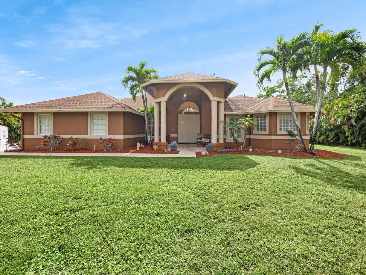 South Florida Real Estate | View 12402 87th Street | 5 Beds, 3 Baths