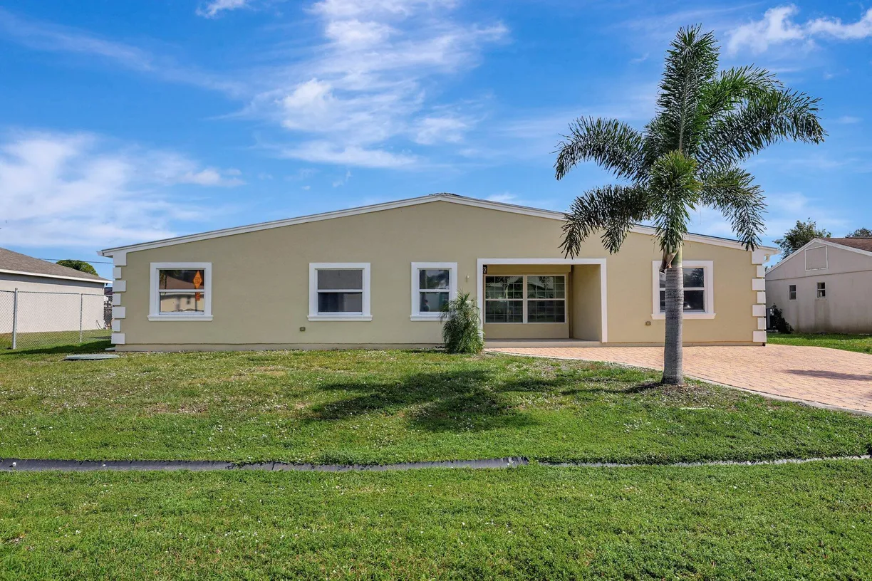 South Florida Real Estate | View 1711 SE Fallon Drive | 4 Beds, 2 Baths