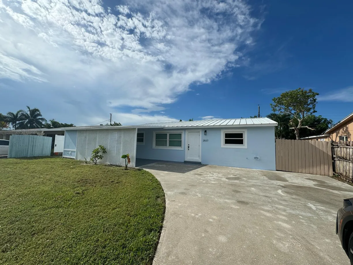 South Florida Real Estate | View 2837 Floweva Street | 3 Beds, 2 Baths