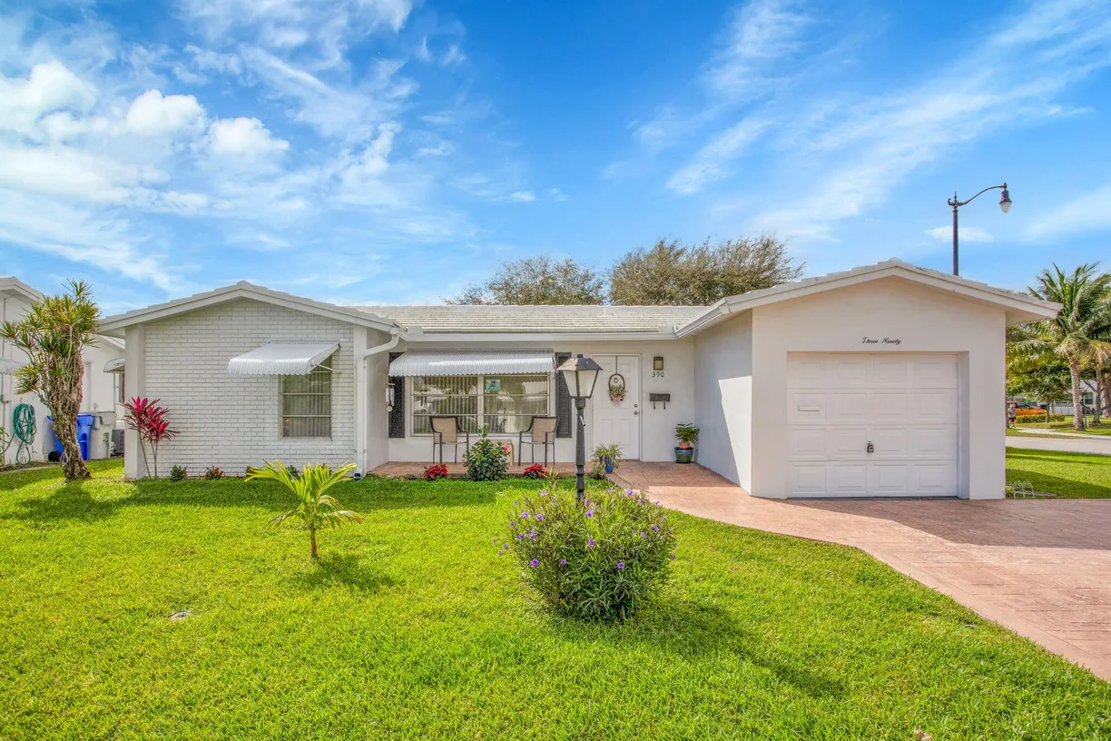 South Florida Real Estate | View 390 NW 25th Court | 2 Beds, 2 Baths
