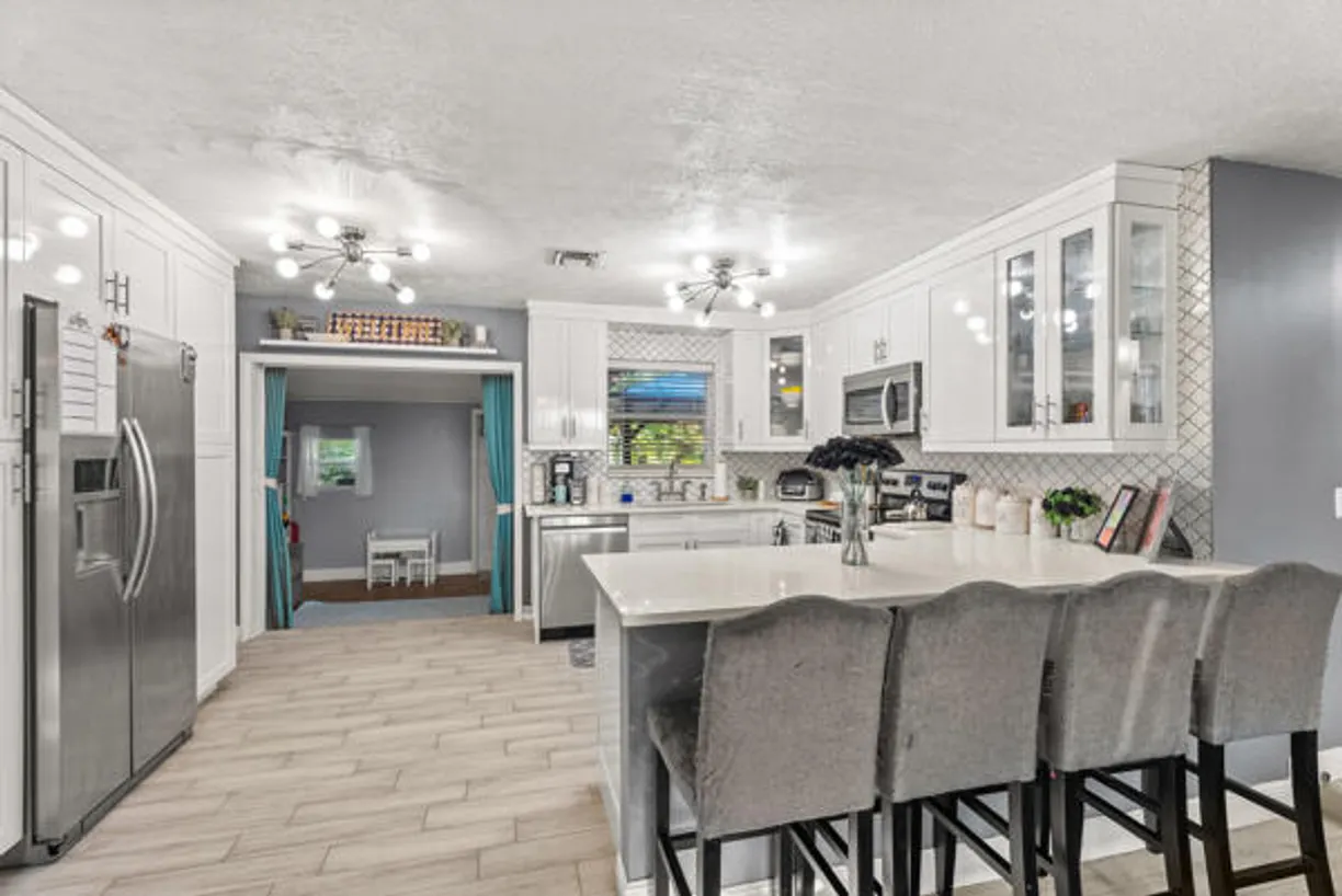 South Florida Real Estate | View 5865 SE Rosemont Avenue | 3 Beds, 2 Baths