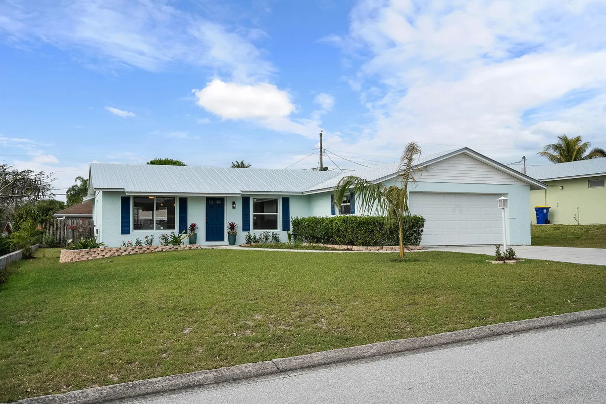 South Florida Real Estate | View 7423 SE James Street | 3 Beds, 2 Baths