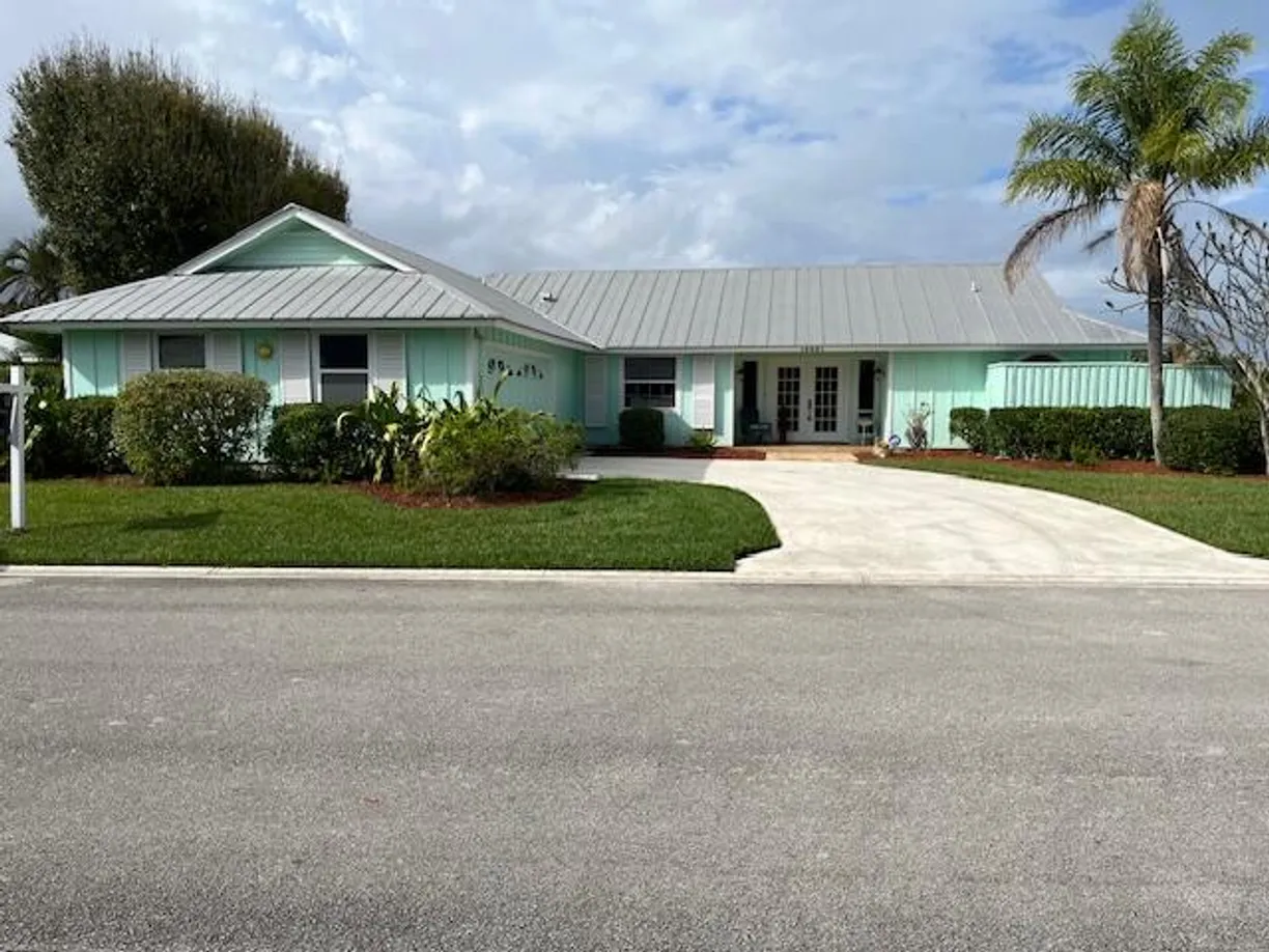 South Florida Real Estate | View 10691 SE Jupiter Narrows Drive | 3 Beds, 2 Baths