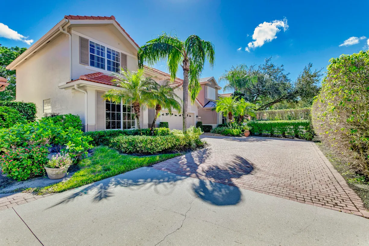 South Florida Real Estate | View 118 Monterey Pointe Drive | 4 Beds, 3 Baths