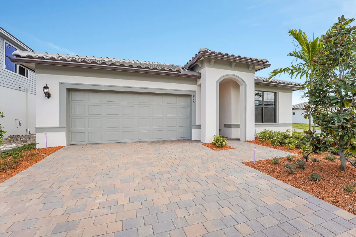 South Florida Real Estate | View 845 SE Courances Drive | 4 Beds, 2 Baths