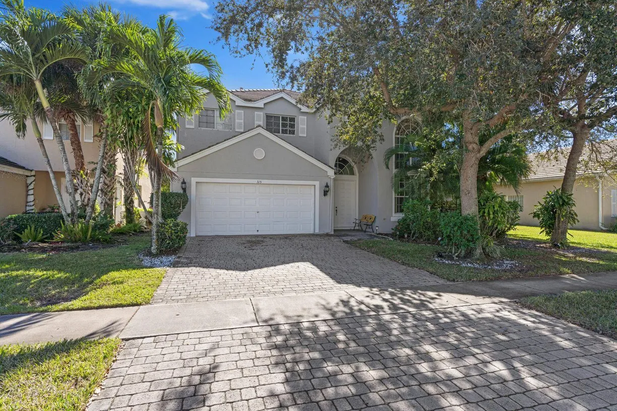 South Florida Real Estate | View 315 Berenger Walk | 4 Beds, 3 Baths