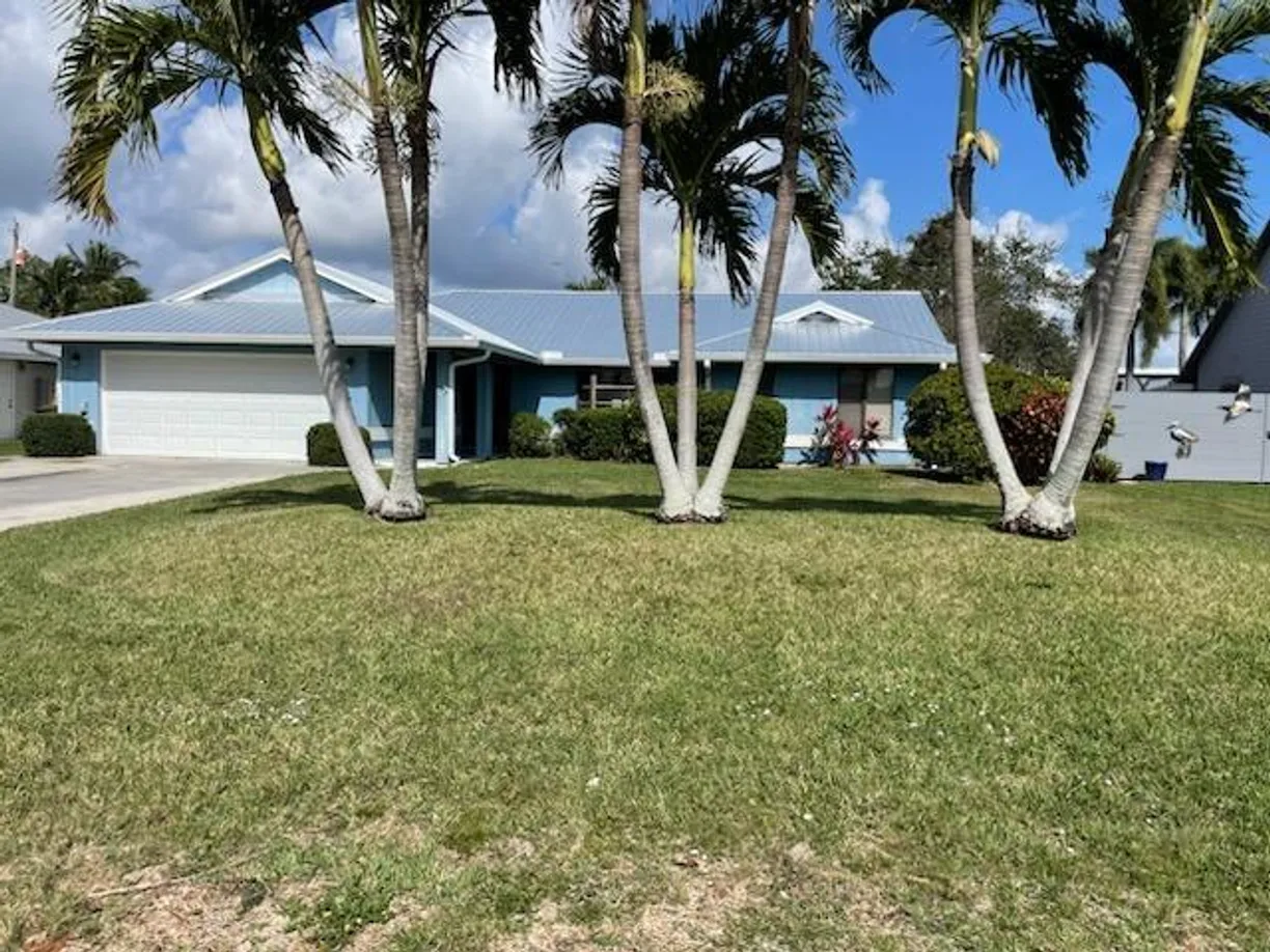 South Florida Real Estate | View 4709 SE Quail Trail | 3 Beds, 2 Baths