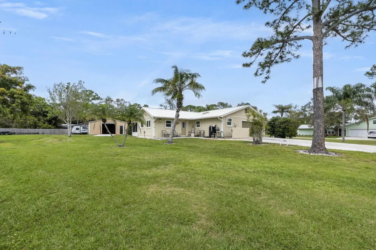 South Florida Real Estate | View 2103 SE Meadowbrook Road | 3 Beds, 2 Baths