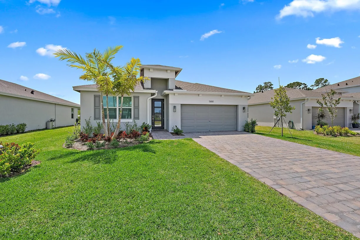 South Florida Real Estate | View 5880 SE Sky Blue Circle | 4 Beds, 2 Baths