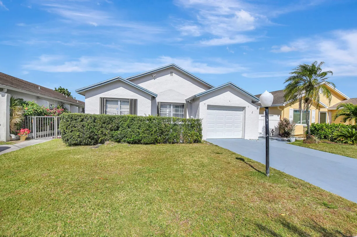 South Florida Real Estate | View 9075 Pine Springs Drive | 3 Beds, 2 Baths