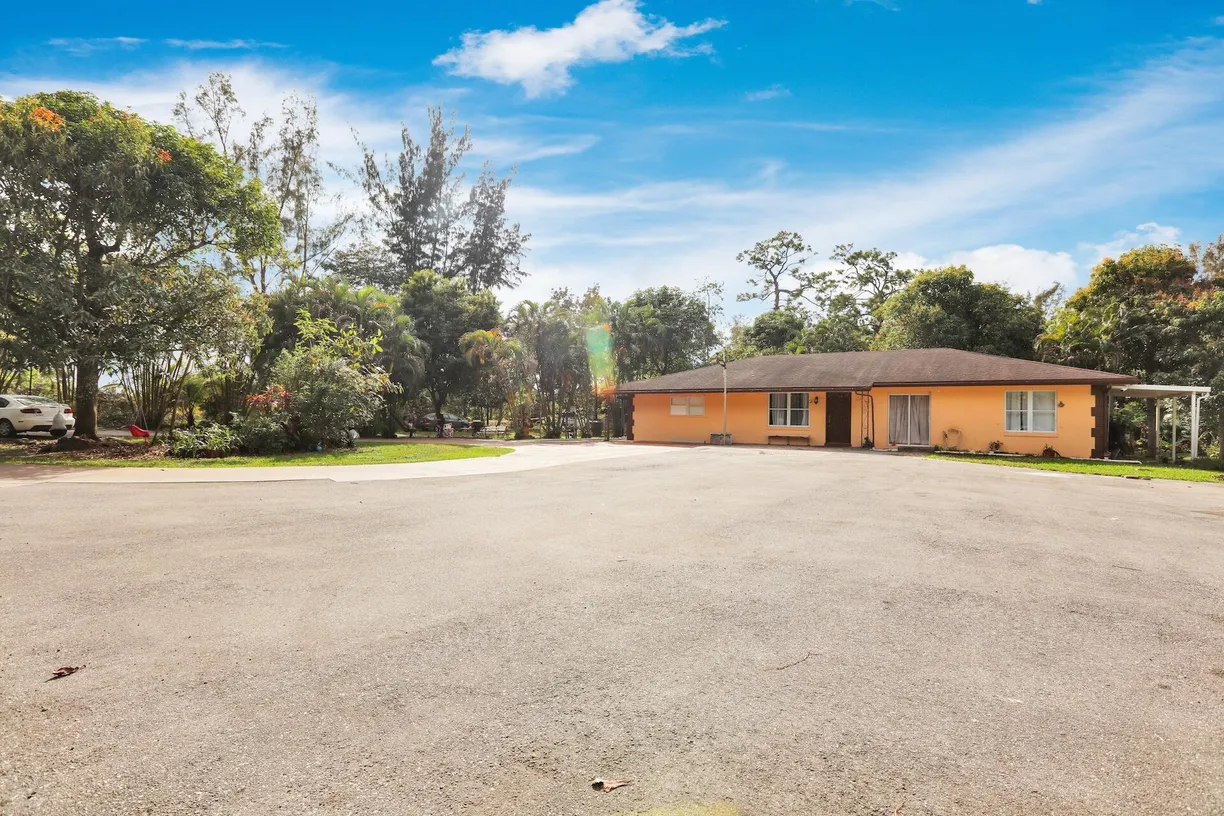 South Florida Real Estate | View 100 Possum Pass | 5 Beds, 3 Baths