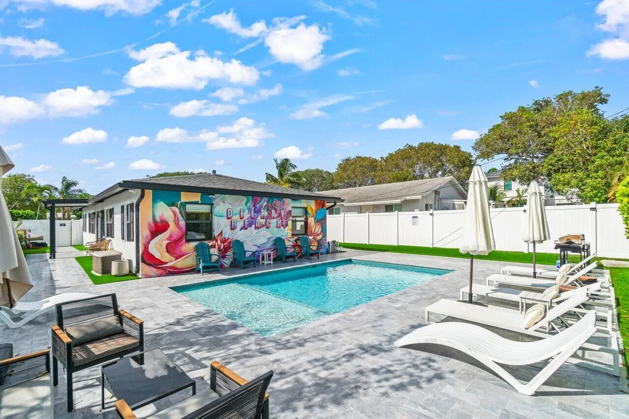 South Florida Real Estate | View 217 NE 11th Street | 4 Beds, 2 Baths