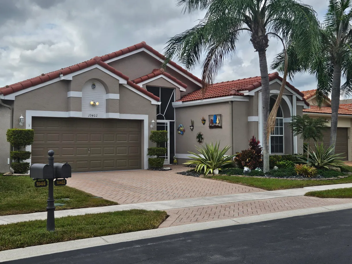 South Florida Real Estate | View 10402 Utopia Circle | 3 Beds, 2 Baths