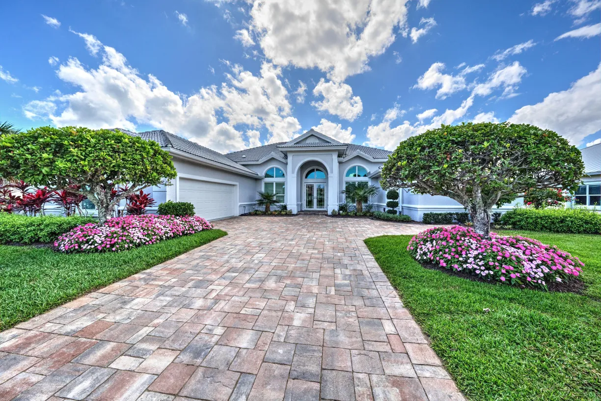 South Florida Real Estate | View 8149 SE Double Tree Drive | 3 Beds, 3 Baths