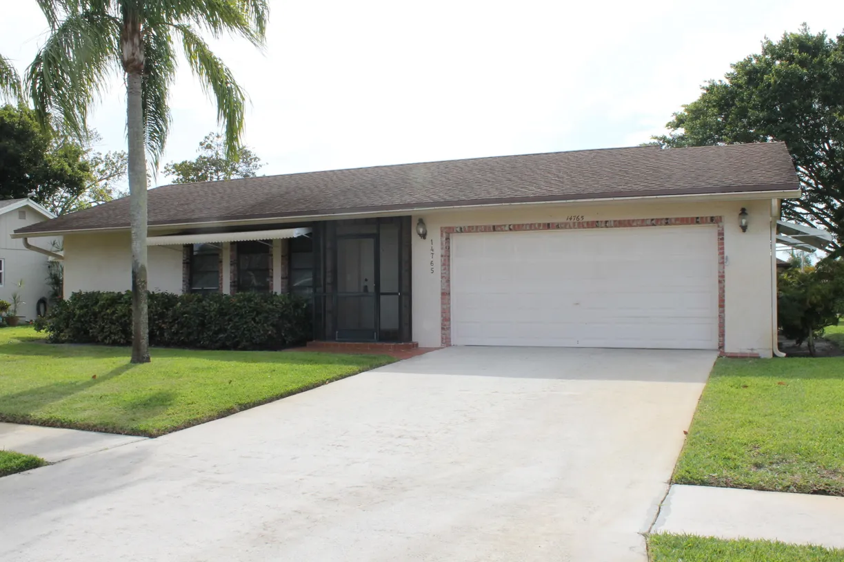 South Florida Real Estate | View 14765 Woodlodge Ln Lane | 2 Beds, 2 Baths