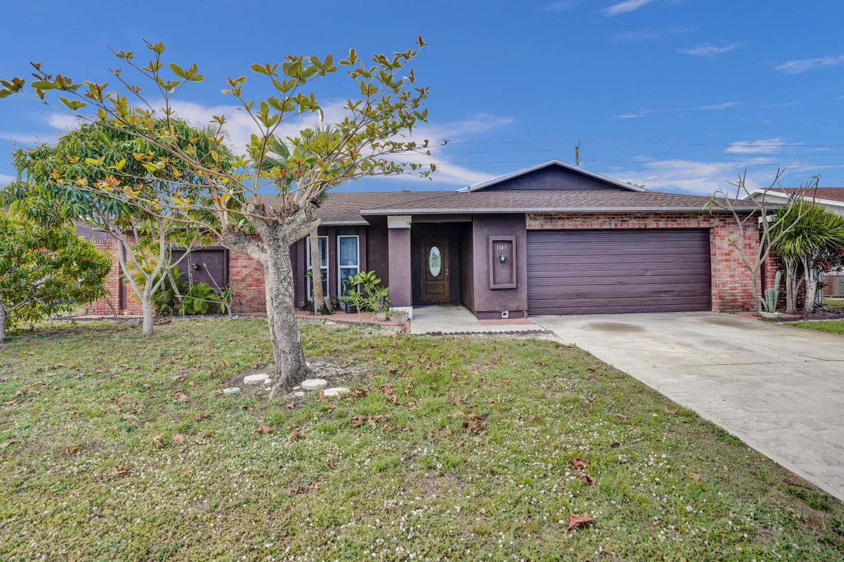 South Florida Real Estate | View 1145 Fernlea Drive | 5 Beds, 2 Baths