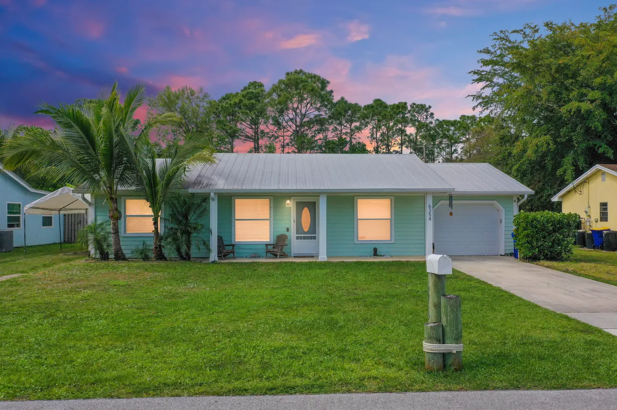 South Florida Real Estate | View 6354 SE Vista Avenue | 3 Beds, 2 Baths