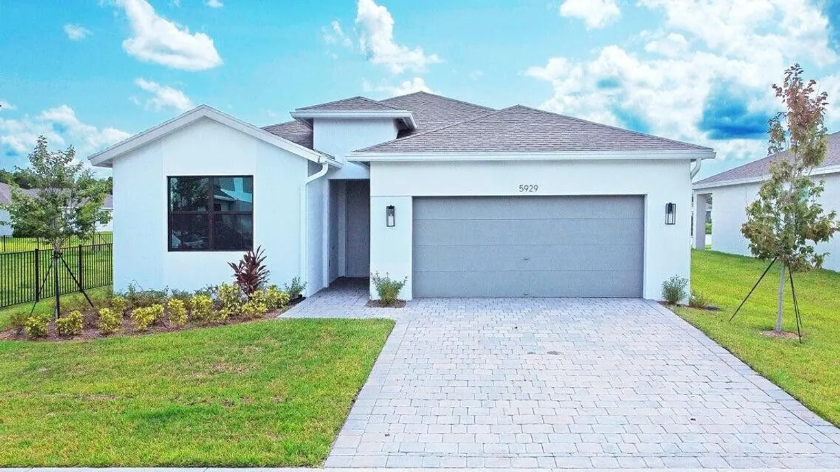 South Florida Real Estate | View 5929 SE Skyblue Circle | 4 Beds, 2 Baths