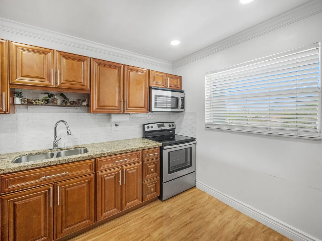South Florida Real Estate | View 6550 Royal Palm Boulevard, 302a | Listing