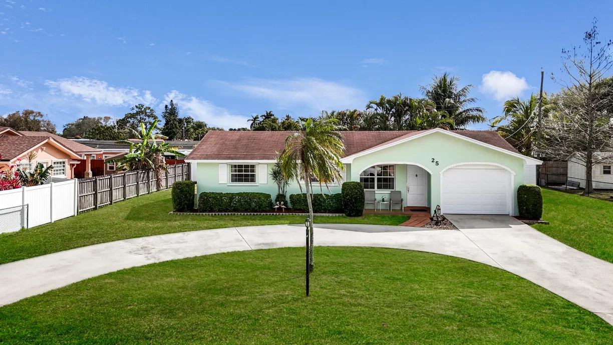 South Florida Real Estate | View 25 W Mango Road | 3 Beds, 2 Baths