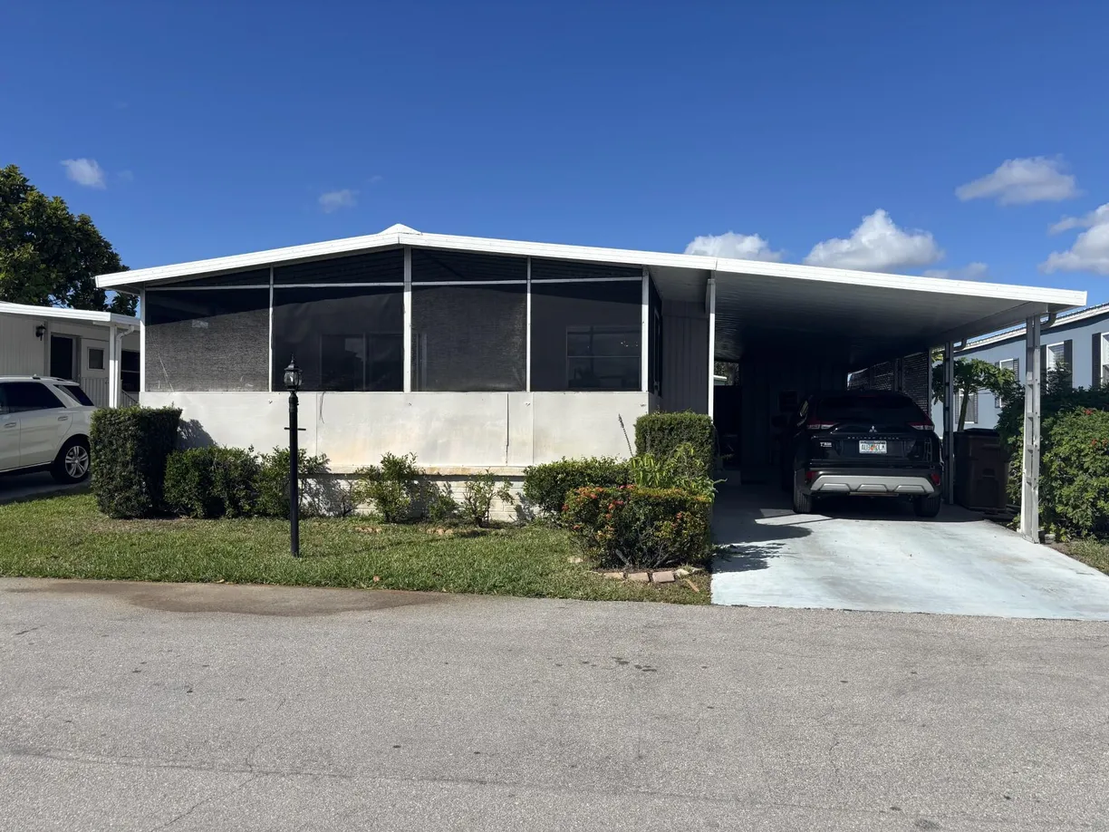 South Florida Real Estate | View 1813 Kingfisher Drive | 2 Beds, 2 Baths
