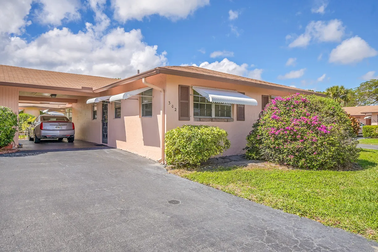 South Florida Real Estate | View 302 Flamingo Lane | 2 Beds, 2 Baths