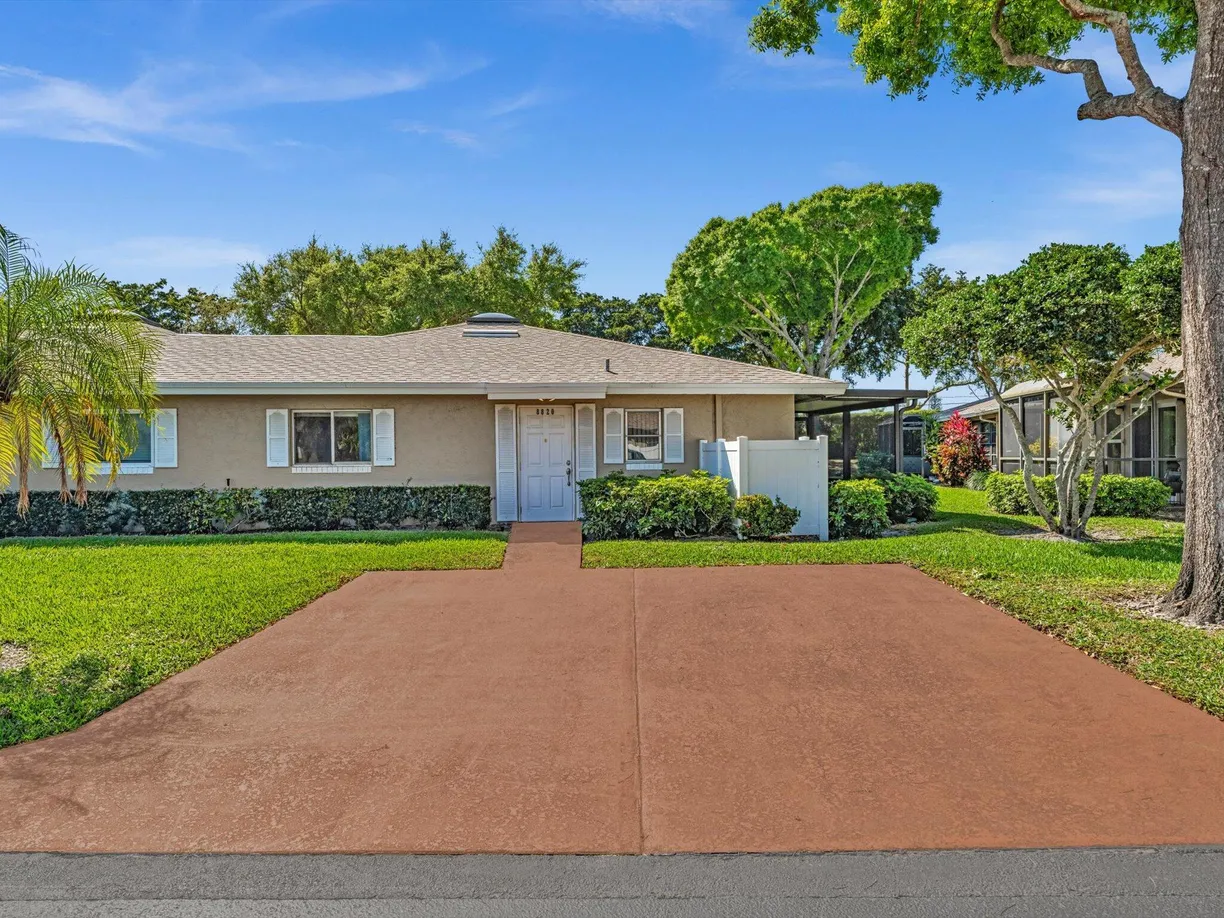 South Florida Real Estate | View 8820 Rheims Road | 2 Beds, 2 Baths