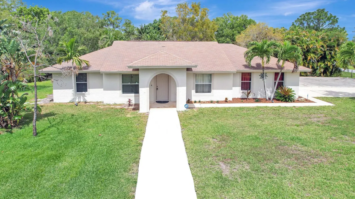South Florida Real Estate | View 12021 61st Street | 3 Beds, 2 Baths