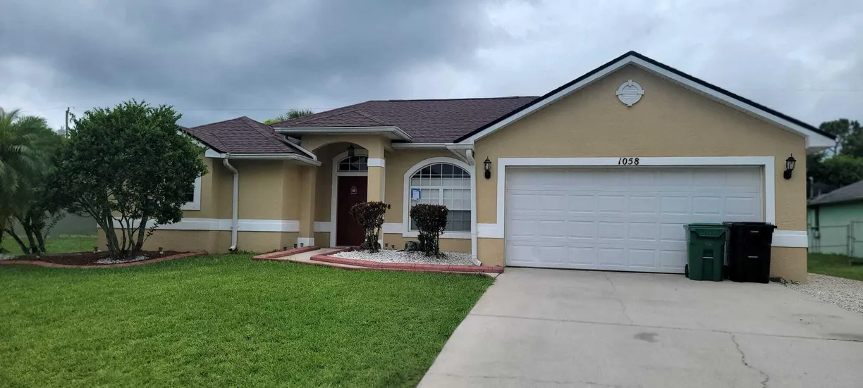 South Florida Real Estate | View 1058 SW Calmar Avenue | 4 Beds, 3 Baths