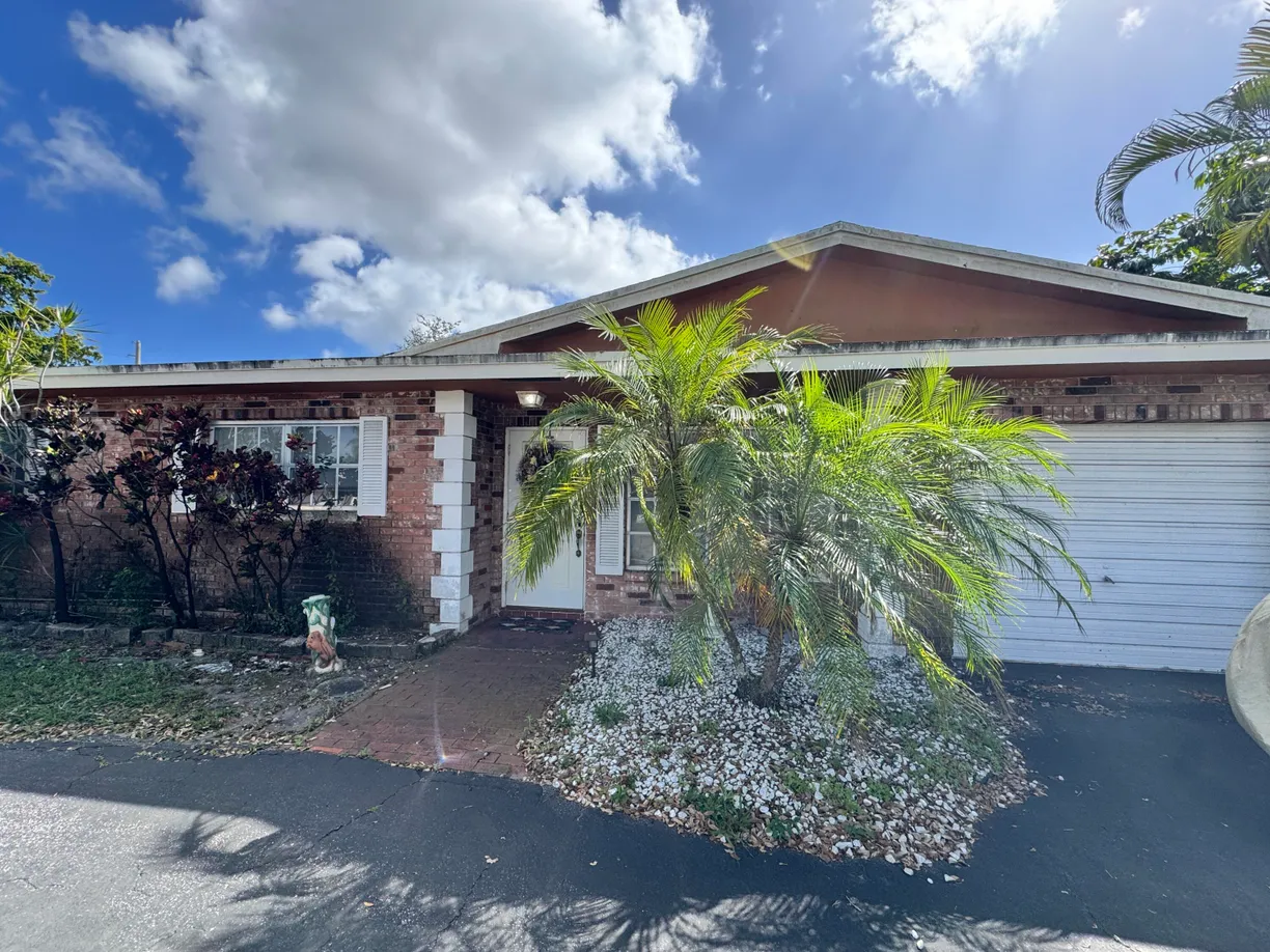 South Florida Real Estate | View 3130 NW 65th Drive | 4 Beds, 2 Baths