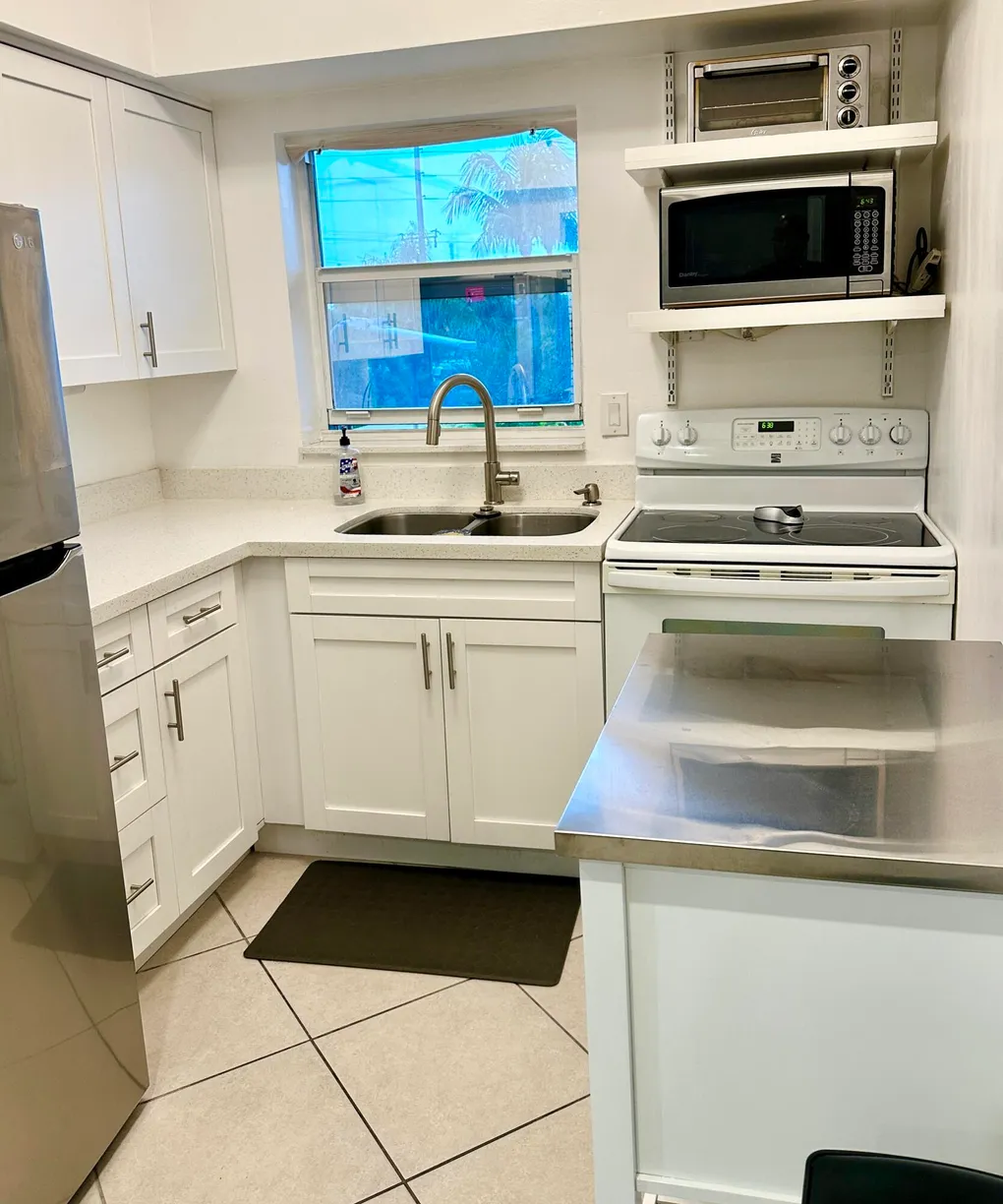 South Florida Real Estate | View 733 NW 30th Court, 6 | Listing
