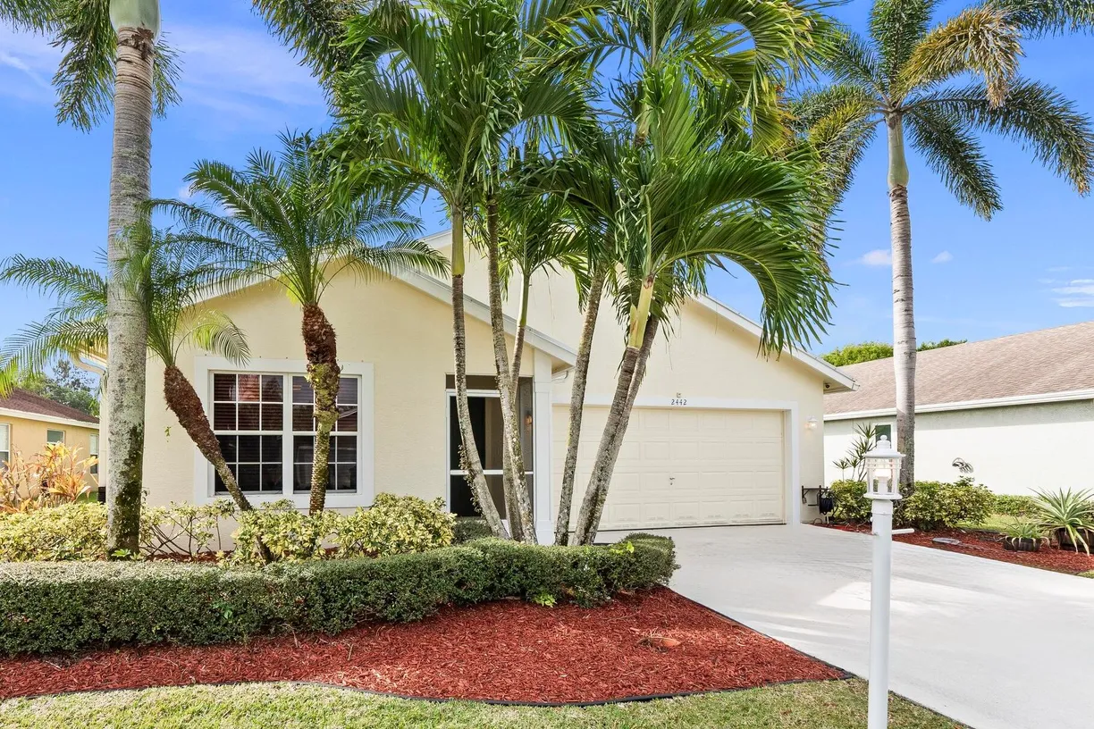 South Florida Real Estate | View 2442 SW Regency Road | 3 Beds, 2 Baths