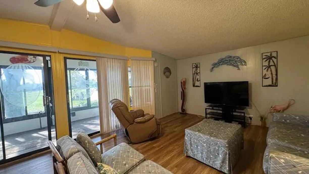 South Florida Real Estate | View 7874 SE Saratoga Drive | Listing