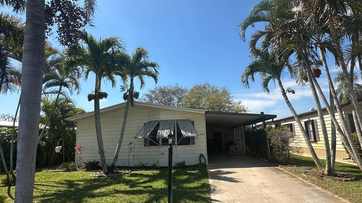 South Florida Real Estate | View 7874 SE Saratoga Drive | 2 Beds, 2 Baths