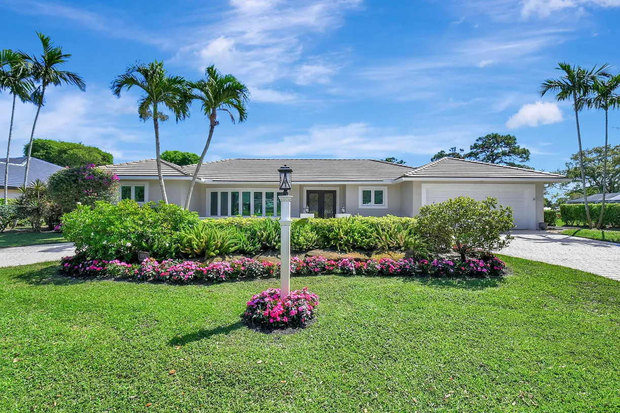 South Florida Real Estate | View 11976 N Lake Drive | 3 Beds, 3 Baths
