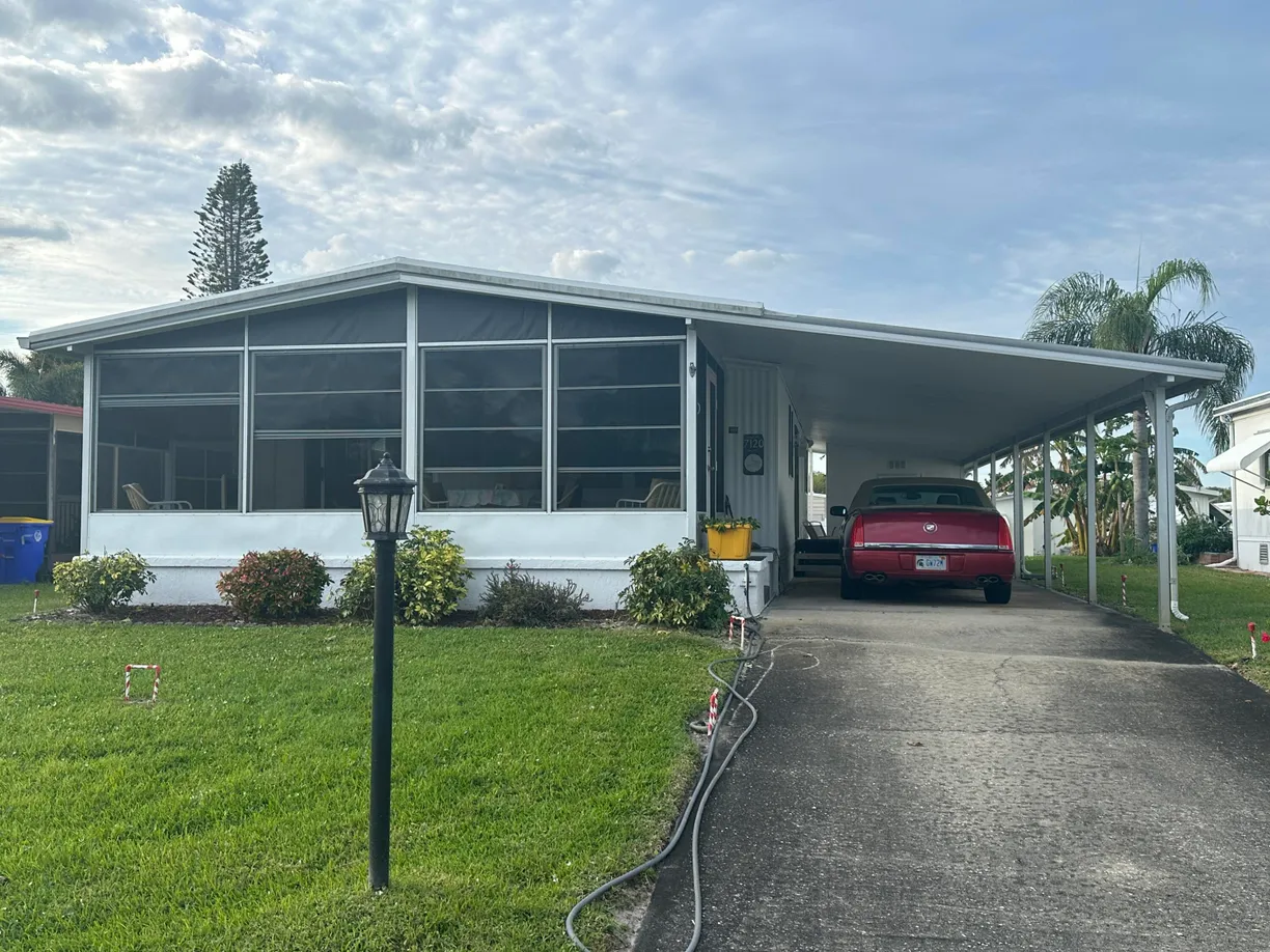 South Florida Real Estate | View 7120 SE Bluebird Circle | 2 Beds, 2 Baths